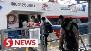 Penangites try out first fast boat ferry ride