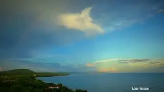 A poetic seaview haven in Bohol, where rainbows arch over the horizon and paint the sky in gold.