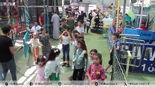 كاميرا الموصلية تواكب اجواء العيد في احد ملاهي الاطفال بحي الجزائر بأيسر الموصل