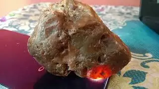 Natural red gemstone raw painite
