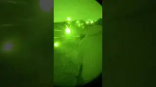 Shooting 400 yards at night at a chem light on a steel target.