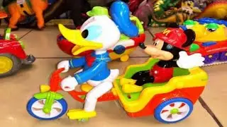 DONALD DUCK AND MICKEY MOUSE RIDE A BIKE Musical Toys for Babies VEHICLES
