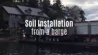 Eagle Island - Soil insallation from a barge using blower trucks