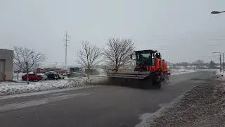 Larue T95 carrier vehicle with FB22 airport front-mounted broom street demo