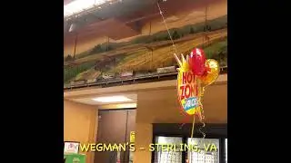 Model Train in Action Above Shoppers at Wegman&rsquo;s - Sterling, Va. 