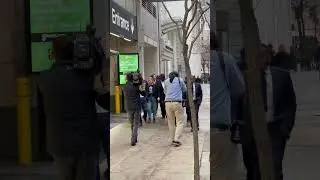 New Chicago Mayor Brandon Johnson Walking Down Dearborn Street