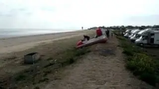 Red Hovercraft going over climb. Leysdown 2011