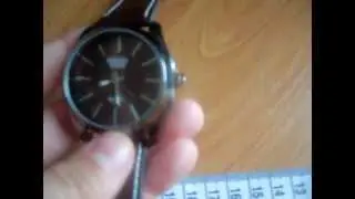 Fashionable Unisex Quartz Wrist Watch with Synthetic Leather Strap for Boy Girl - Brown W86-9550.AVI