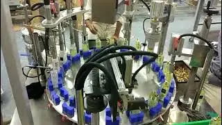 (Without Outer Cover)AILE Automatic Turntable Type Perfume Filling Machine In Customer Factory