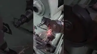 Off Hand Grinding being done for Re-design Tumbler Gear handle position.