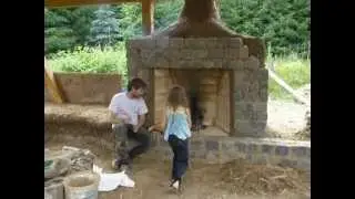 Cob Dragon rocket mass heater bench and 2 rumford fireplaces