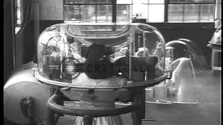 Assembling transparent aircraft gun turrets in a manufacturing plant in the Unite...HD Stock Footage