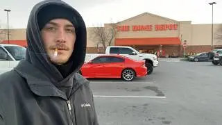 Smoking a Cigarette in a Home Depot Parking Lot