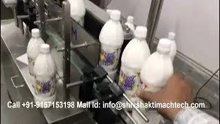 Round Phenyl Bottle Labeling Machine in Africa | Bottle Labelling for Phenyl & Cleaning Products