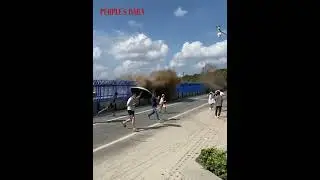 Qiantang River tidal bore took tourists by surprise!