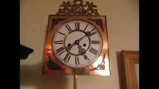 Настенные часы в металлическом корпусе с механизмом Schlenker & Kienzle