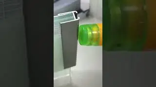 Laminated glass with decorative fabric interlayer and aluminum frame