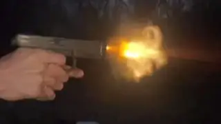 22 LR slow motion with with muzzle flash in the dark