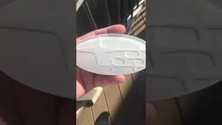 White pearl Subaru emblem
