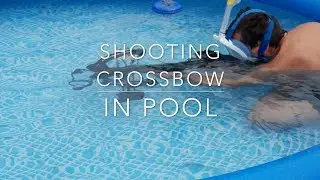 Shooting a crossbow in a pool
