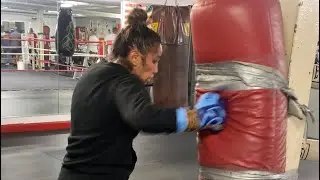 Amanda Serrano working on the wall bag