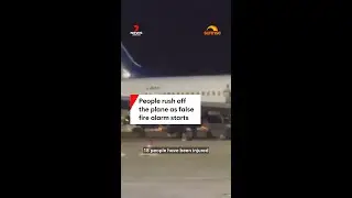 People rush off the plane as false fire alarm starts