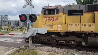 Union Pacific #3884 leading, tc&w #2016 leading and CP #5031 leading triple train video 