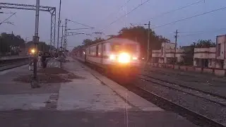 High Speed - Whining WAP7 Poorva Express Crossing Dildarnagar Junction !!