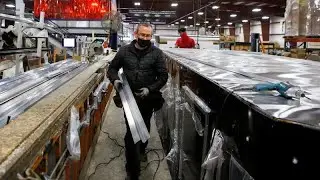 U.S. business activity slows; home sales rise