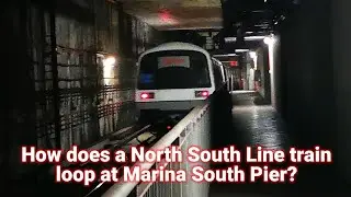 How does a North South Line train loop at Marina South Pier?