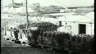 Ship delivers munitions to France in World War I. Rail cars transport artillery s...HD Stock Footage