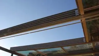 Retractable insulated glass roof system