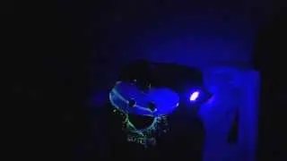 A 447nm laser shining on a glow-in-the-dark object.