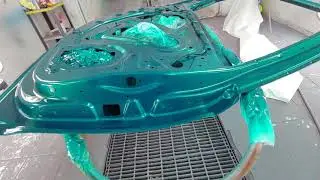 Cadillac Kandy Teal over silver.