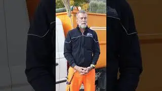 Cleaning a recycling island. A clean city starts with you.