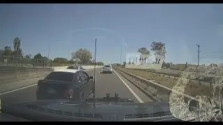 Aussiecams - Boy racer in Subaru Liberty accelerates at high speed through traffic M7 QLD