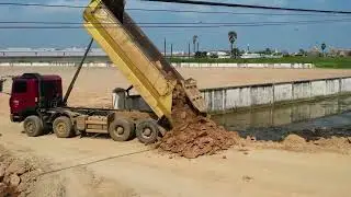 Dump Truck Paving the Road &ndash; Real Construction Power in Action!