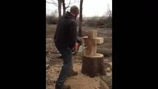 Carving a cross in a stump