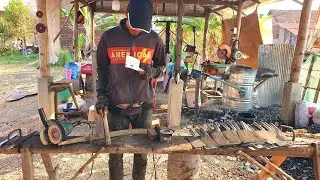 A Young Blacksmith Sharpens Knives