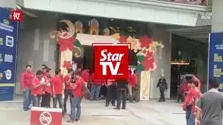 Red-shirt rally goers gather at Sogo