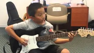 Sandy Guitar Student