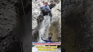 #Tourists form human wall to #save boy trapped in rushing stream #lnspireChina #fyp #fypシ #likechina
