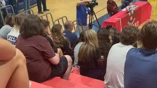 Dwyer High School crowd cheers as athletes sign