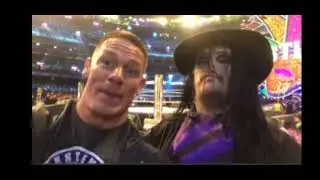 John cena with the undertaker at WM34.