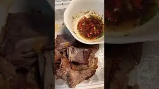 Beijing duck bone and meat dip spicy sauce , bone very crunchy 👍