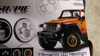 Bring the Lumens!  Jeep light on a Miata!