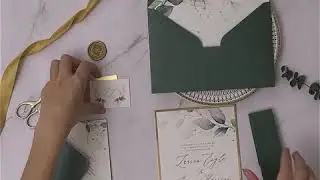 DIY greenery wedding invitation set with emerald green envelope and belly band
