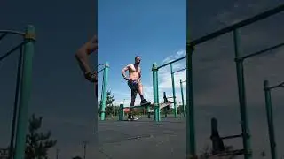 Runner's stretch on the lowest bar