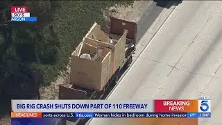 Big rig hits overpass on 110 Fwy; SigAlert in effect