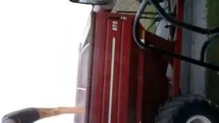 7088 unloading corn on the go.